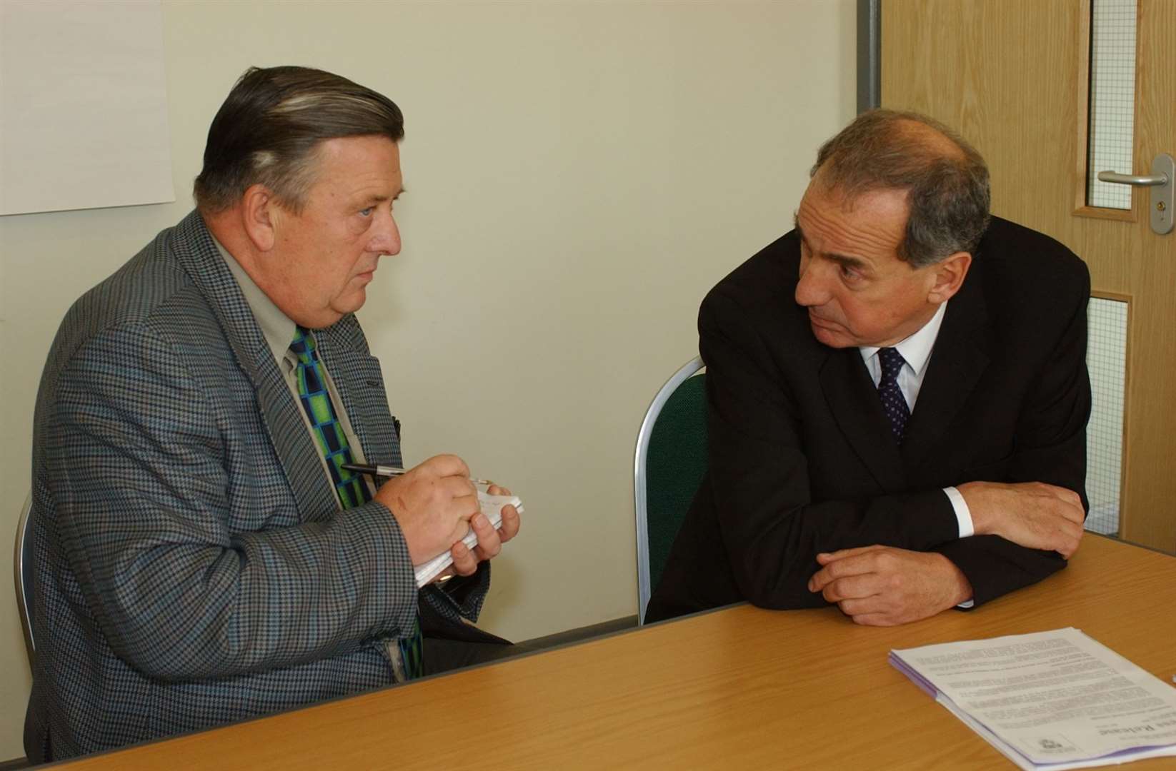 Mr Bennett interviewing the former transport minister Dr Kim Howells at the Julie Rose Stadium in 2003