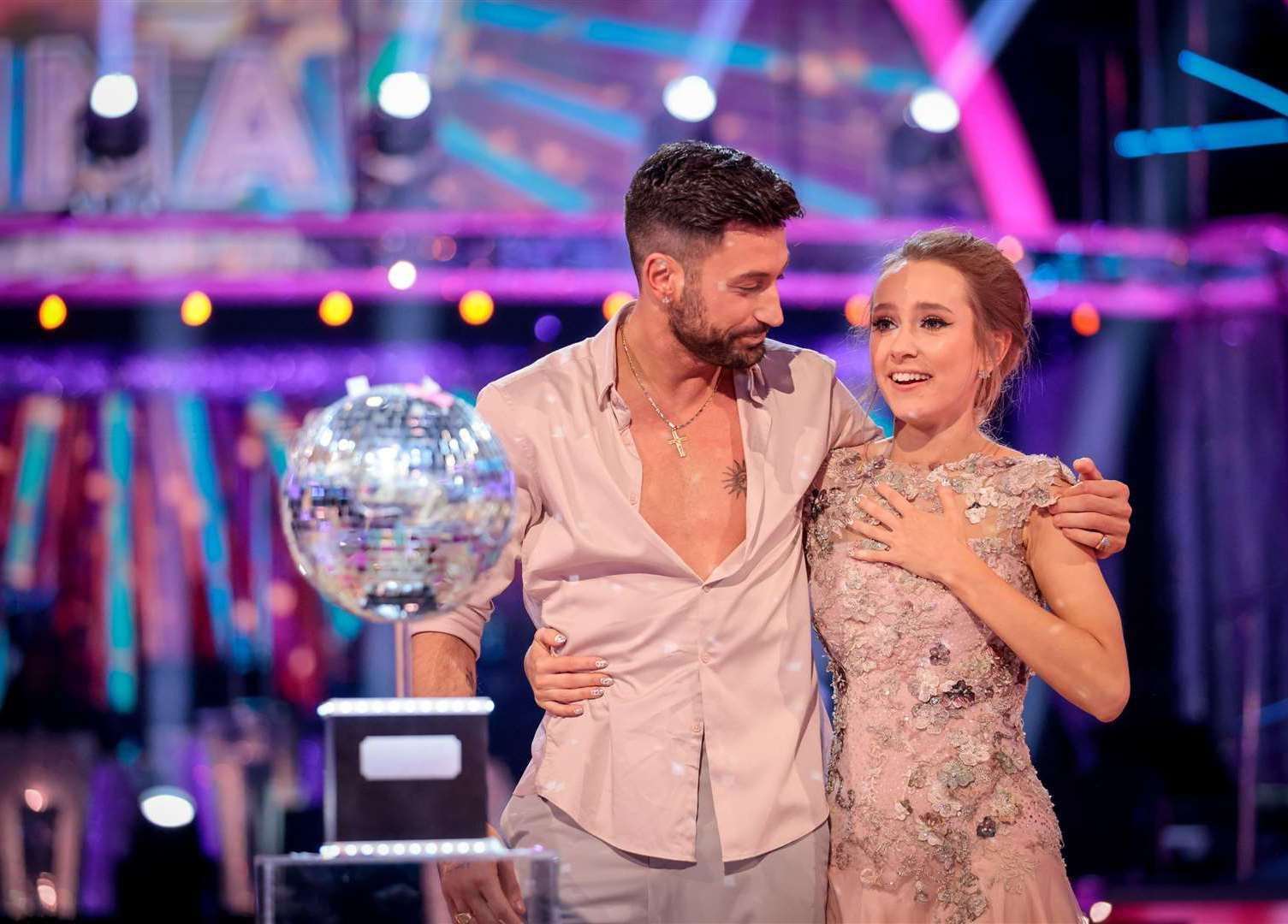 Giovanni Pernice and Rose Ayling-Ellis with the glitterball trophy during the final of Strictly Come Dancing 2021. Picture: BBC