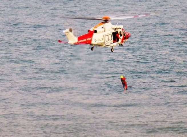 The woman is winched to safety. Picture: Folkestone Coastguard