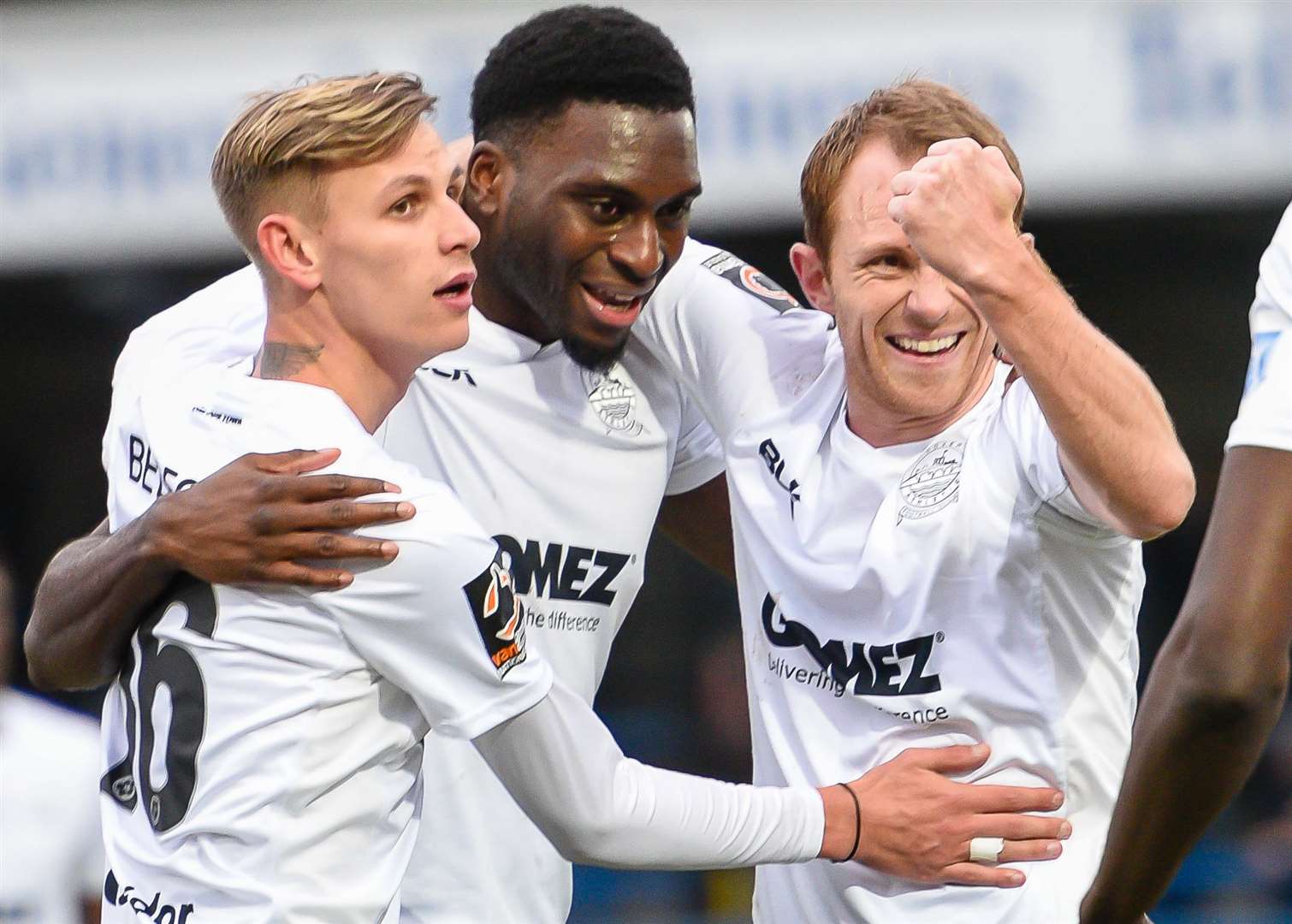Inih Effiong, centre, celebrates his goal with Joe Bedford, left, and Stuart Lewis Picture: Alan Langley