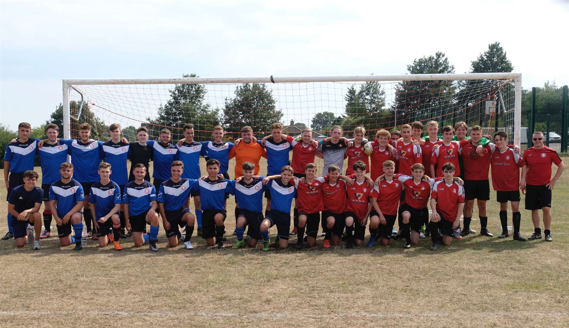 Istead Rise and an invitational squad line up before the match held in memory of Elliott Holmes