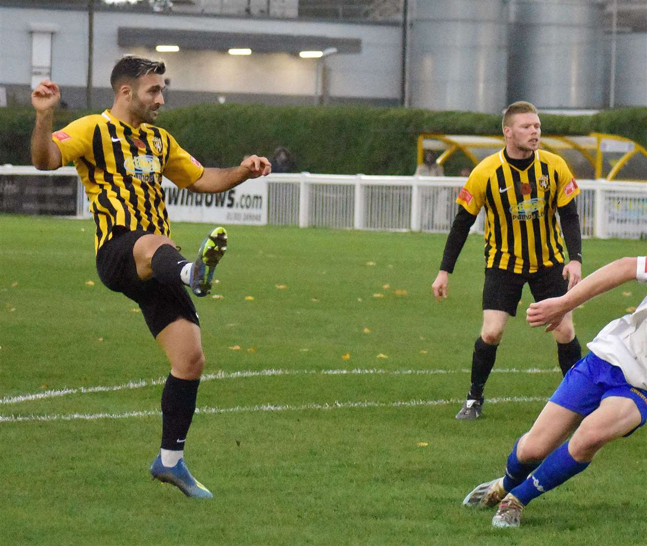 Kieron McCann, who also scored a hat-trick at Wingate & Finchley on Tuesday, firing home Invicta's first in the FA Trophy win over Faversham on Saturday. Picture: Randolph File
