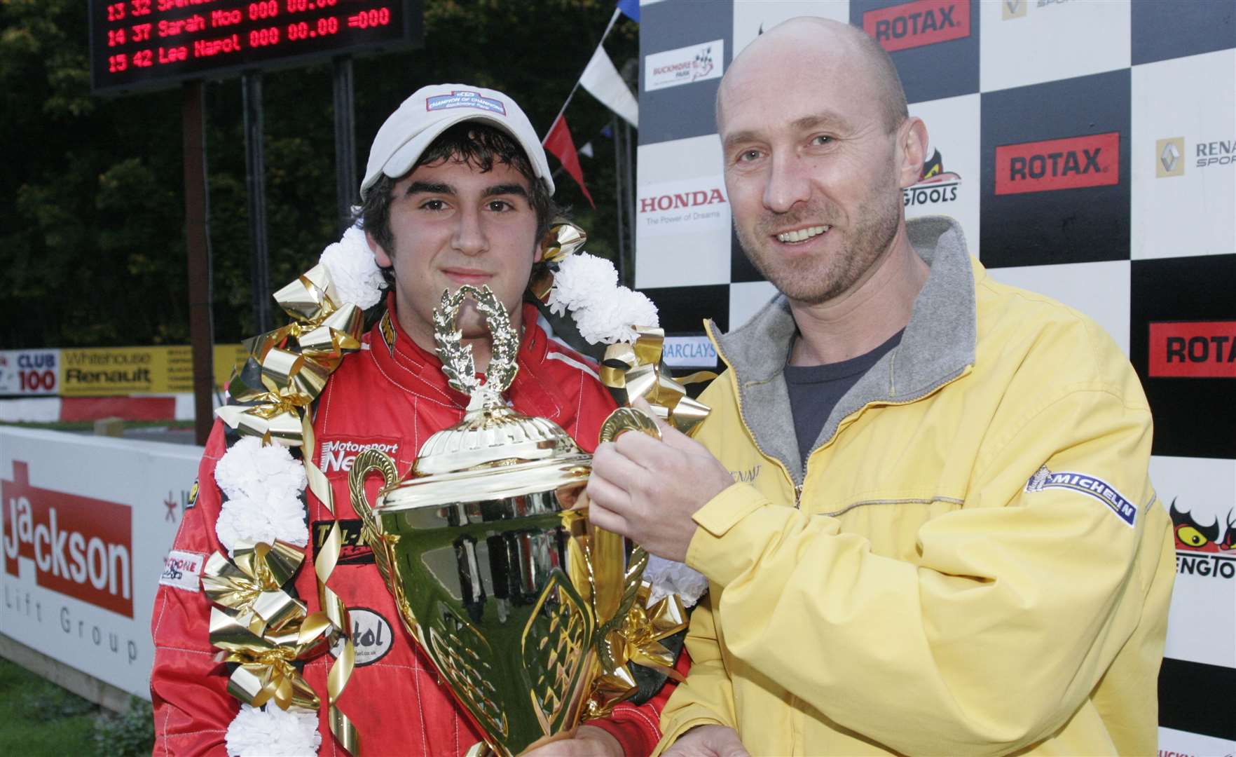 Malvern – whose younger brother Jon is Lando Norris's trainer – was presented with the Champion of Champions trophy in October 2005 by Perry McCarthy, Top Gear's original Stig. Picture: Peter Still