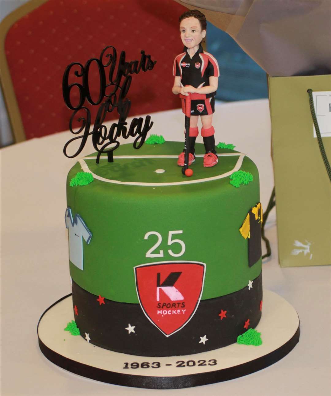 A celebratory cake marking Jenny Divall’s 60 years at K Sports Hockey Club. Picture: Ryan Wood