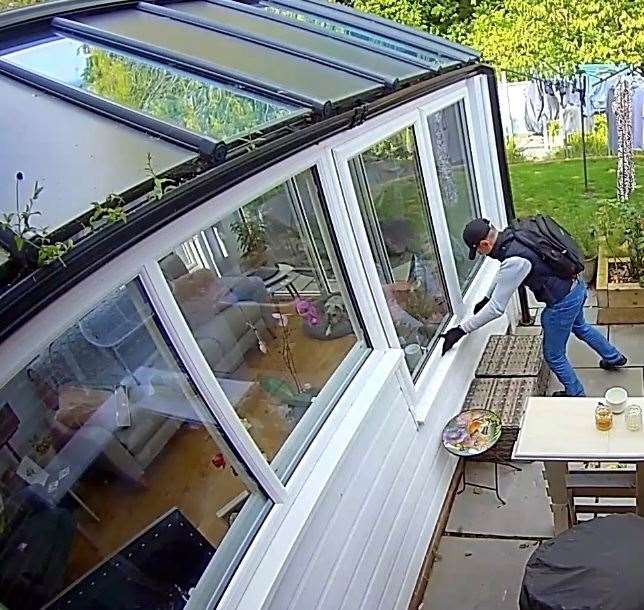 The man was seen leaving through a conservatory window