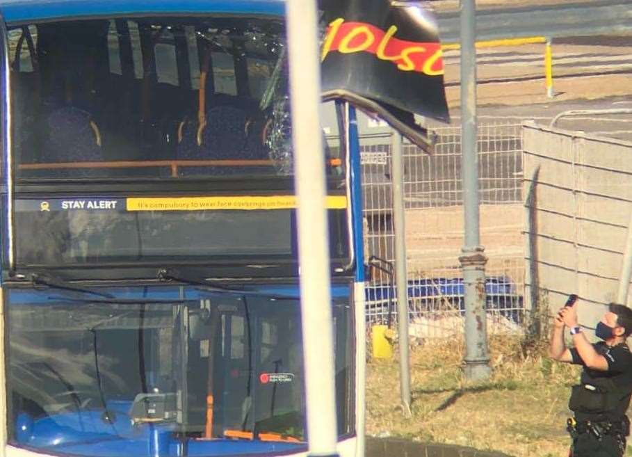 The sign could be seen sticking out of the bus following the crash. Picture: Steve Wood
