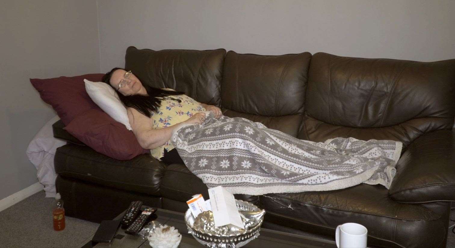 Jane Roberts, 59, says she is forced to sleep on her sofa due to noise issues