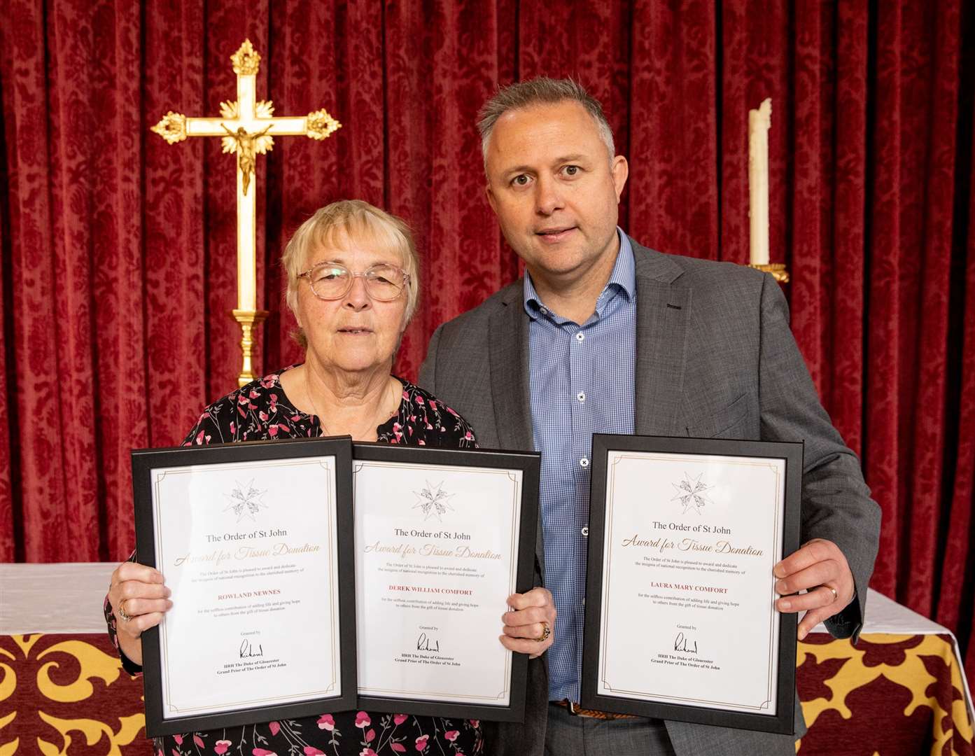 Diana Comfort with son Owain, receiving the awards on behalf of their lost loved ones. Picture: Diana Comfort
