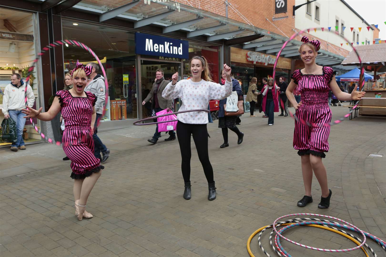 Hobbit and Tilly of the Pantaloonies show kmfm's Emma Jo how to hula hoop. Picture: Martin Apps