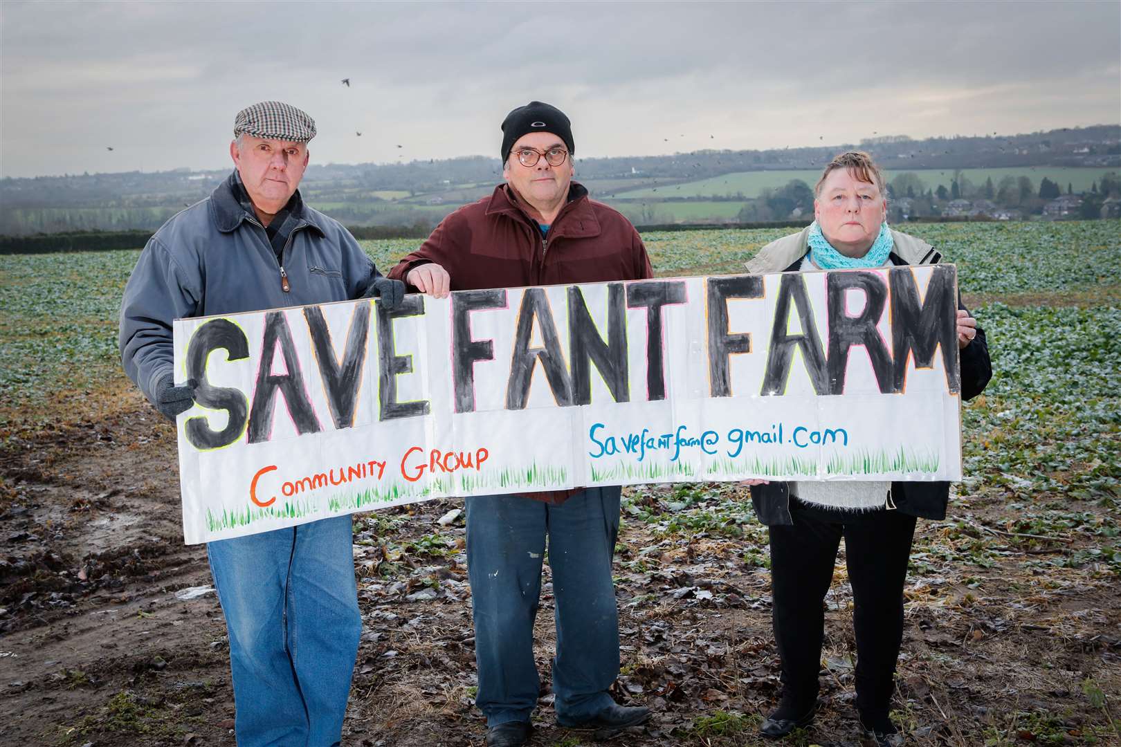 Gareth Owen of the Save Fant Farm Action Group with Brian and Barbara Skinner, making their message clear