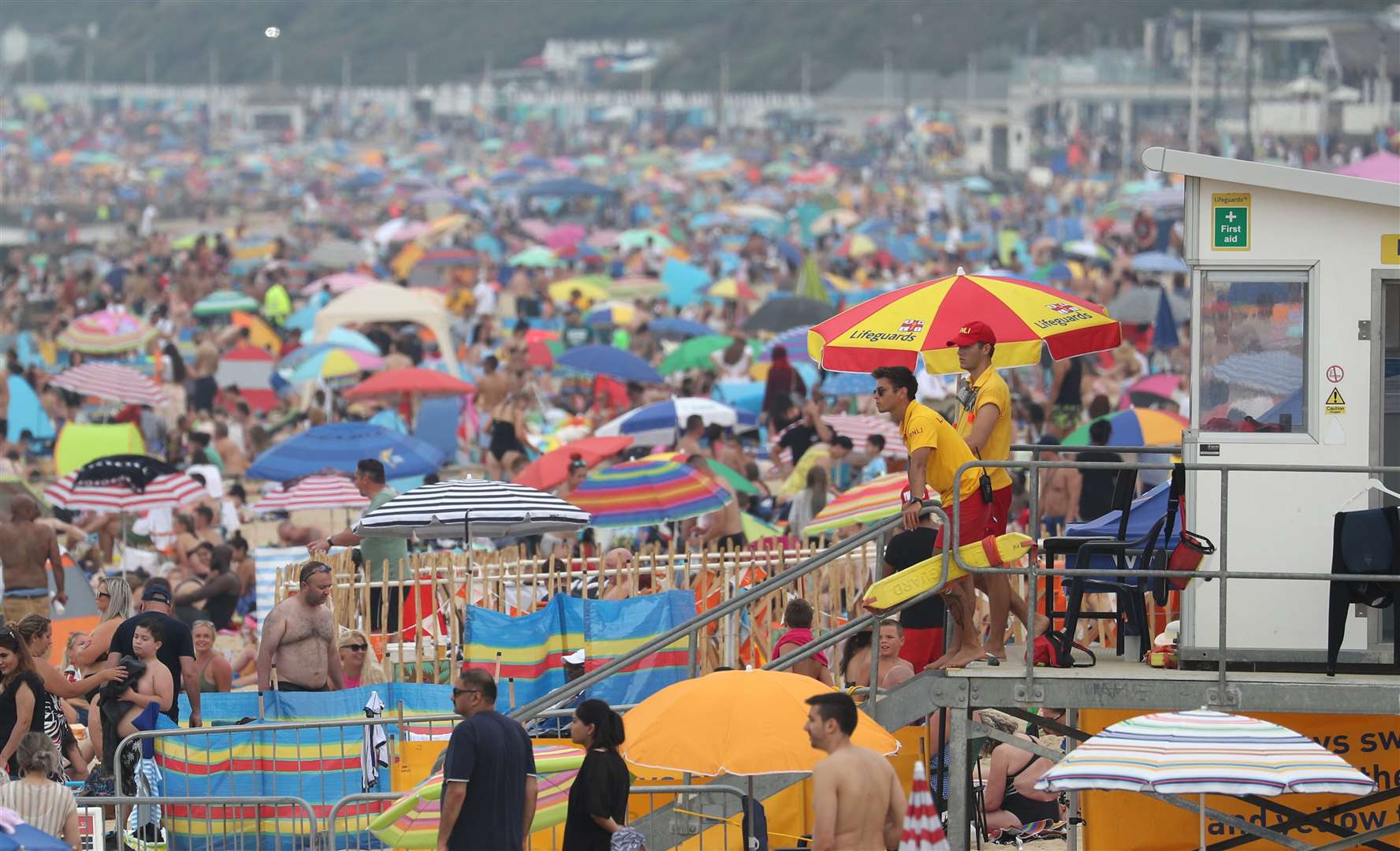 People enjoy the hot weather at Bournemouth beach (Andrew Matthews/PA)