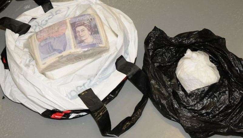 Cash and cocaine was found in the air bag compartment of his car