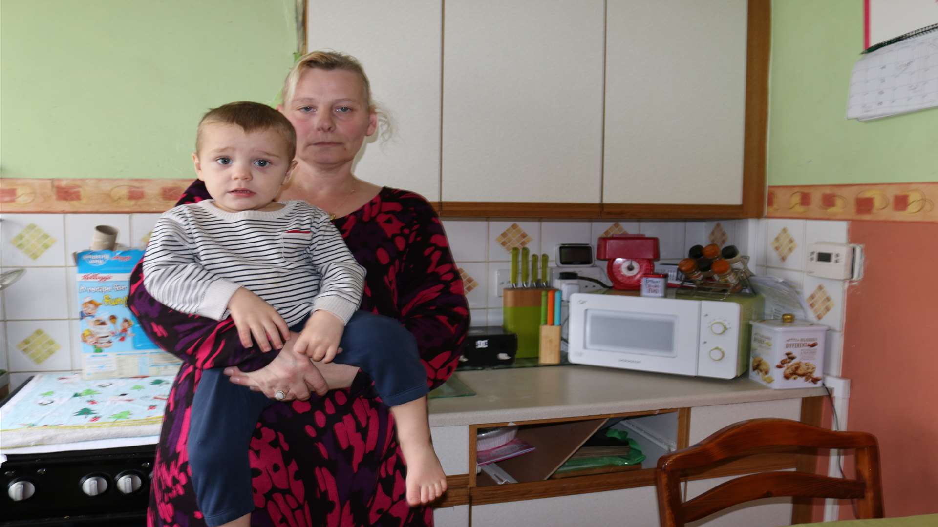 Sinead De Lobel and her son Callum, aged two, who suffers from asthma and is affected by the damp and mould in their home in Dickens Road, Gravesend