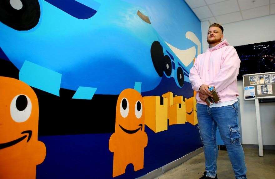 Martins Abols created the mural of Peccy, the Amazon mascot