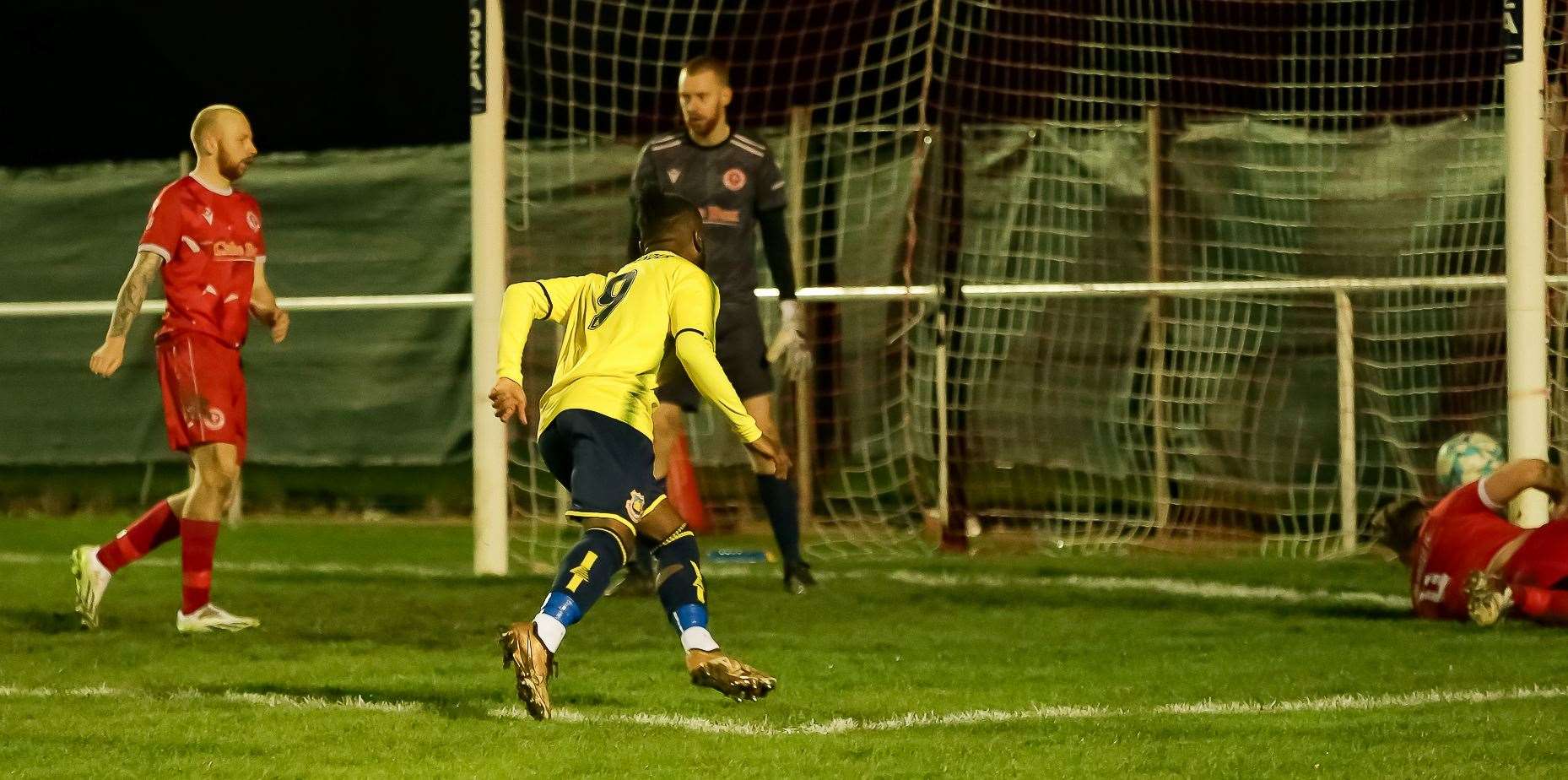Striker Steadman Callender puts the ball just inside the post for Whitstable's second goal. Picture: Les Biggs