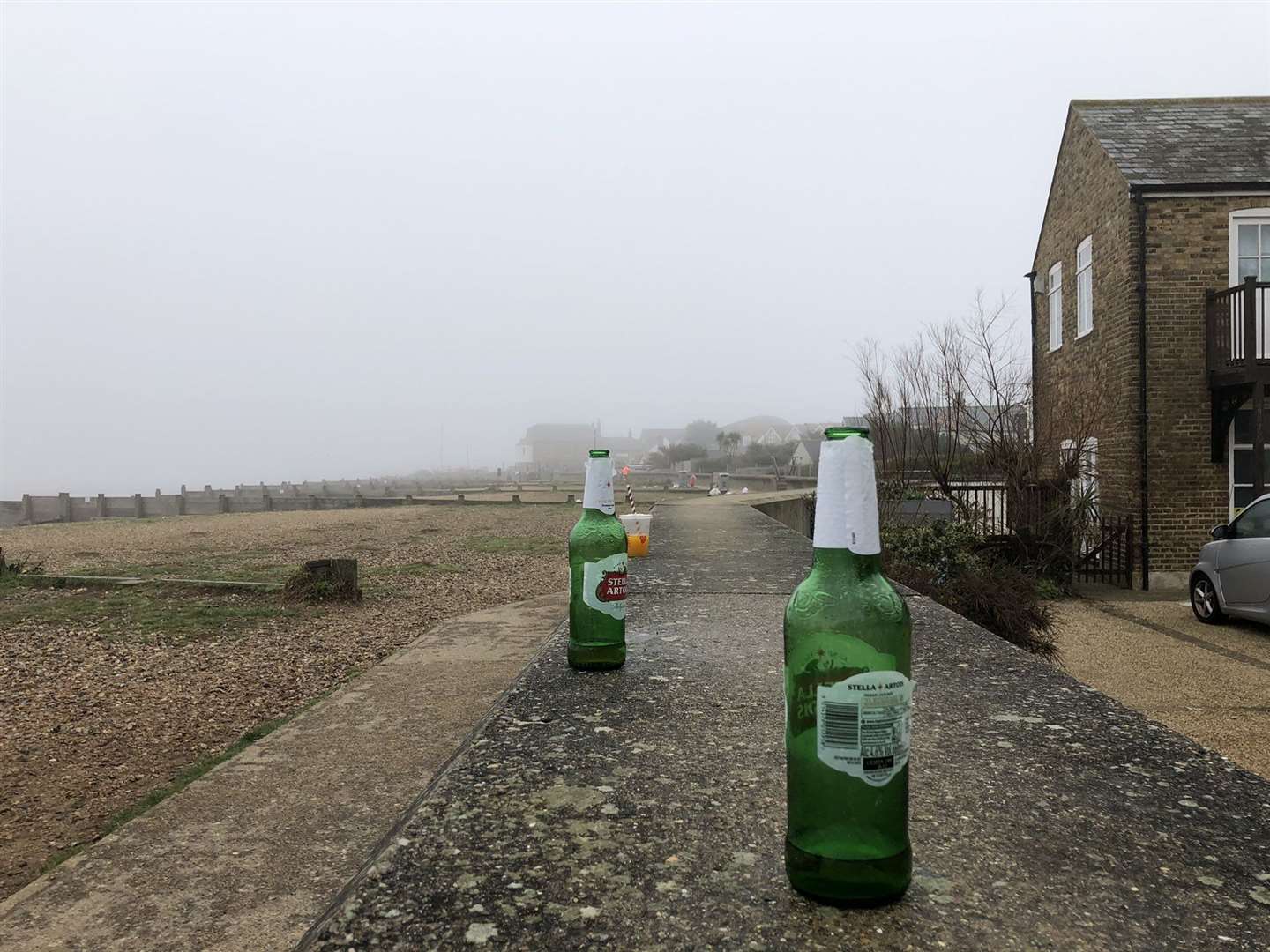 Beer bottles left along the seafront. Picture: David Cramphorn