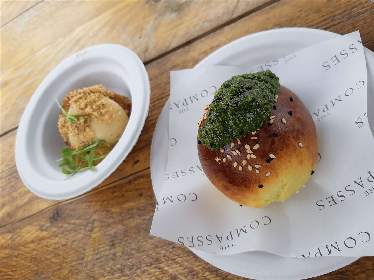 Crispy ox cheek with caramelised onion, miso mayonnaise and bacon crumb and confit lamb brioche bun with wild garlic pesto from The Compasses at Crundale