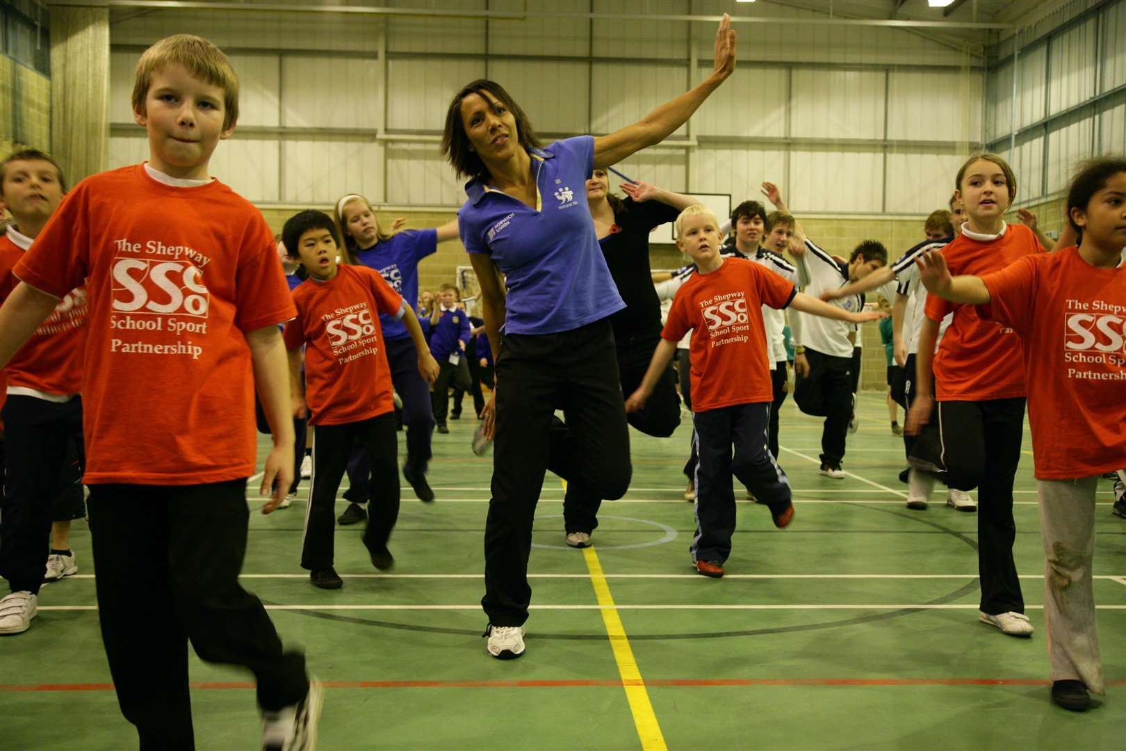 Dame Kelly Holmes gets kids working out at a school
