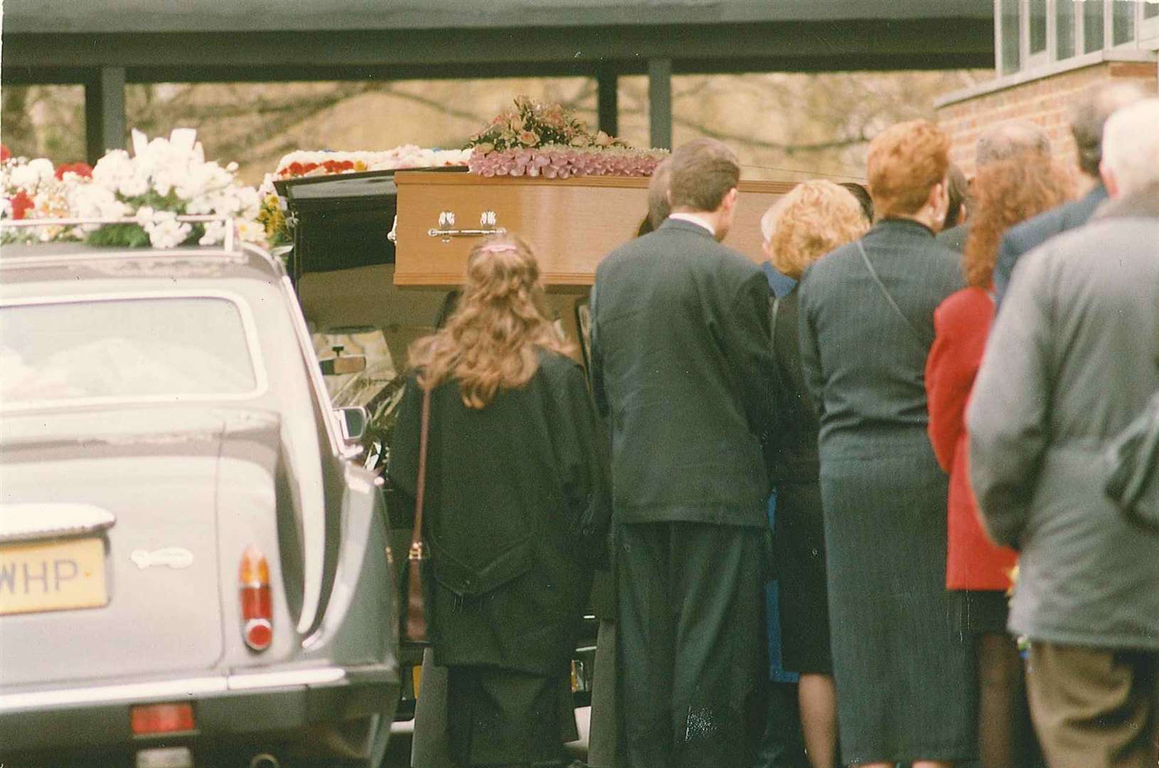 Mourners gather at the funeral in 1993 of school girl Claire Tiltman