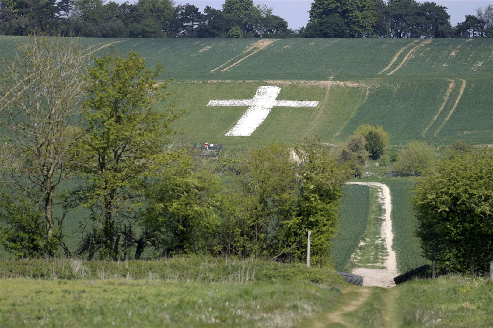 The chalk cross is high on a hill