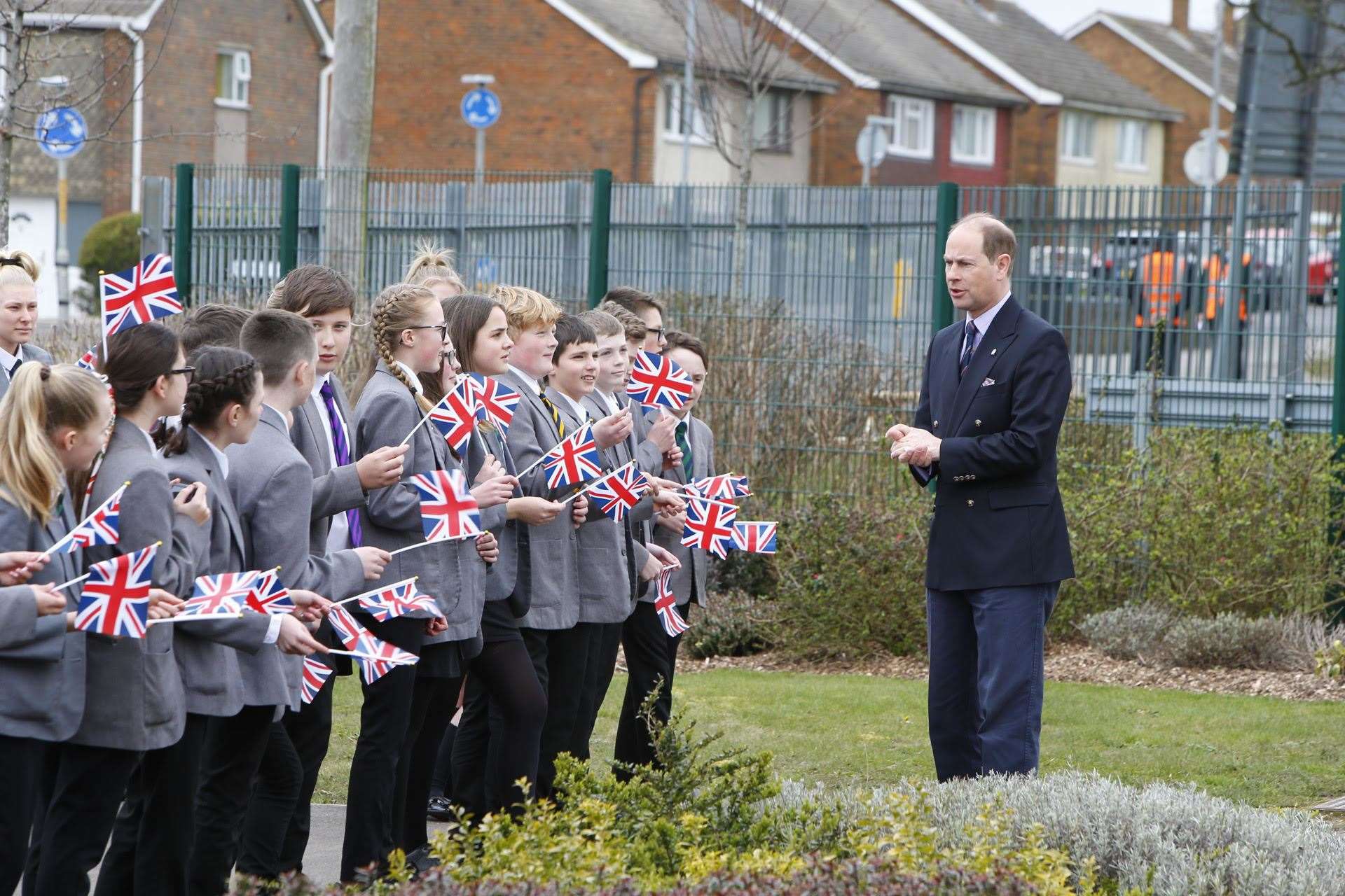 The Prince chats to pupils as soon as he arrives