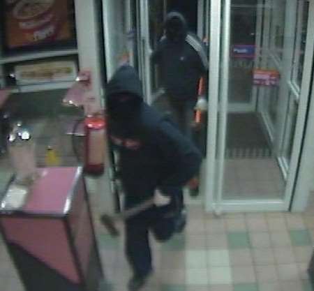 The two men entering the restaurant. Picture courtesy KENT POLICE