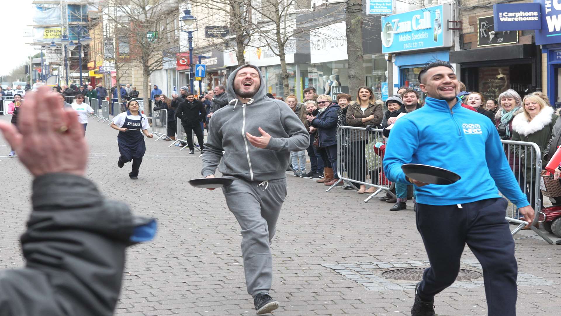 Rajan Dhaliwal, from NRG came first and Gary Lane from Kulakuts second at a pancake race in Gravesend Town Centre during the heats.