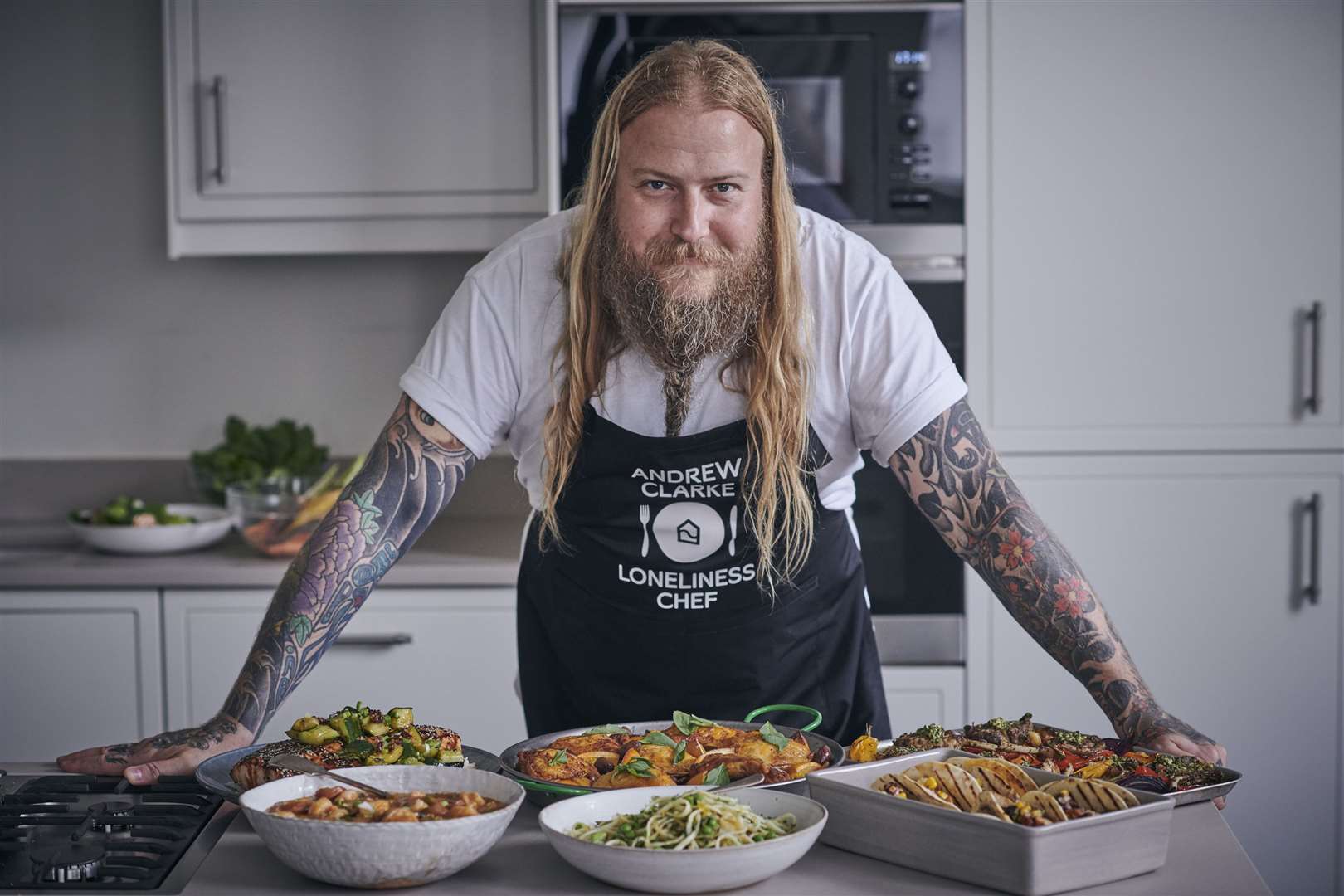 Britain's first 'National Loneliness Chef', Andrew Clarke had aspirations of becoming a rock guitarist before a career in catering called. Photo credit: SpareRoom/Campaign to End Loneliness (18287713)