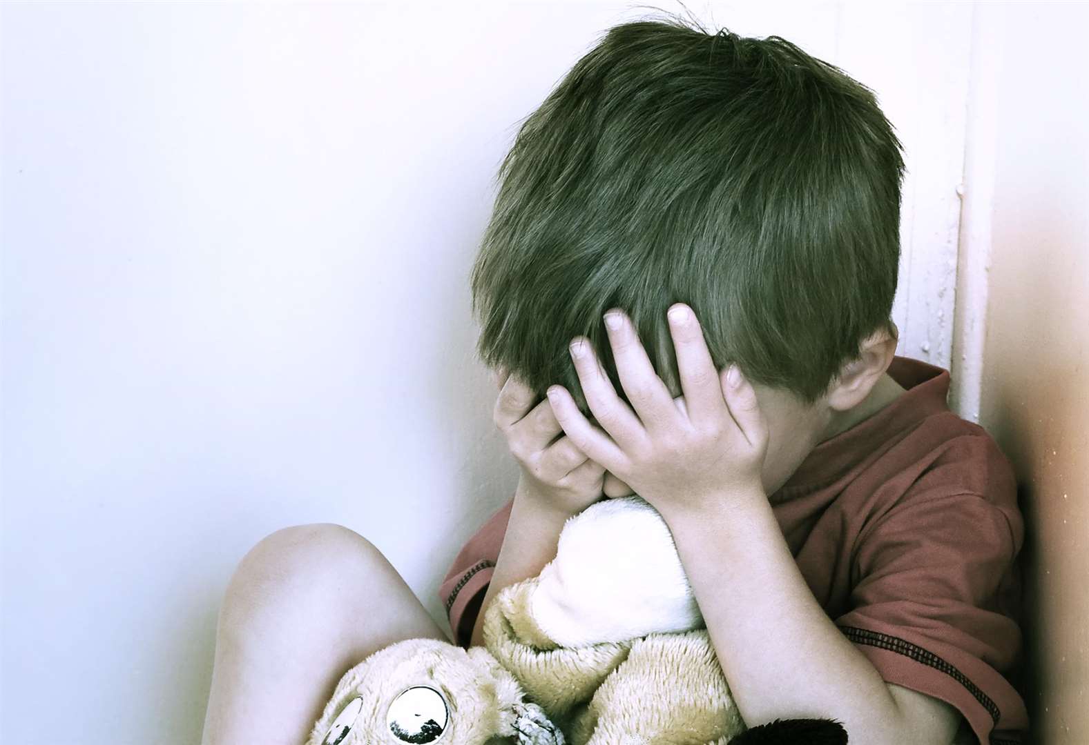 Poor language, communication or social skills can be a sign of child abuse. Stock image