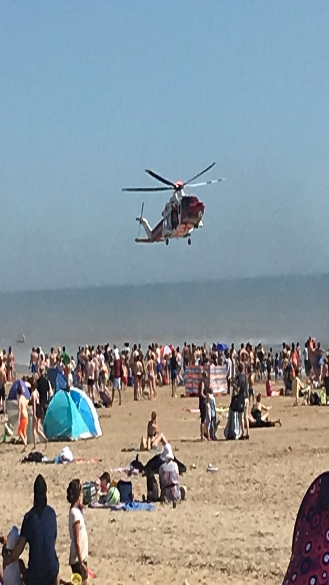 The scene at Camber Sands when five men died last summer