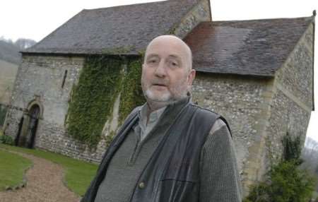 Owner Doug Chapman outside the former church at the Lost Village of Dode