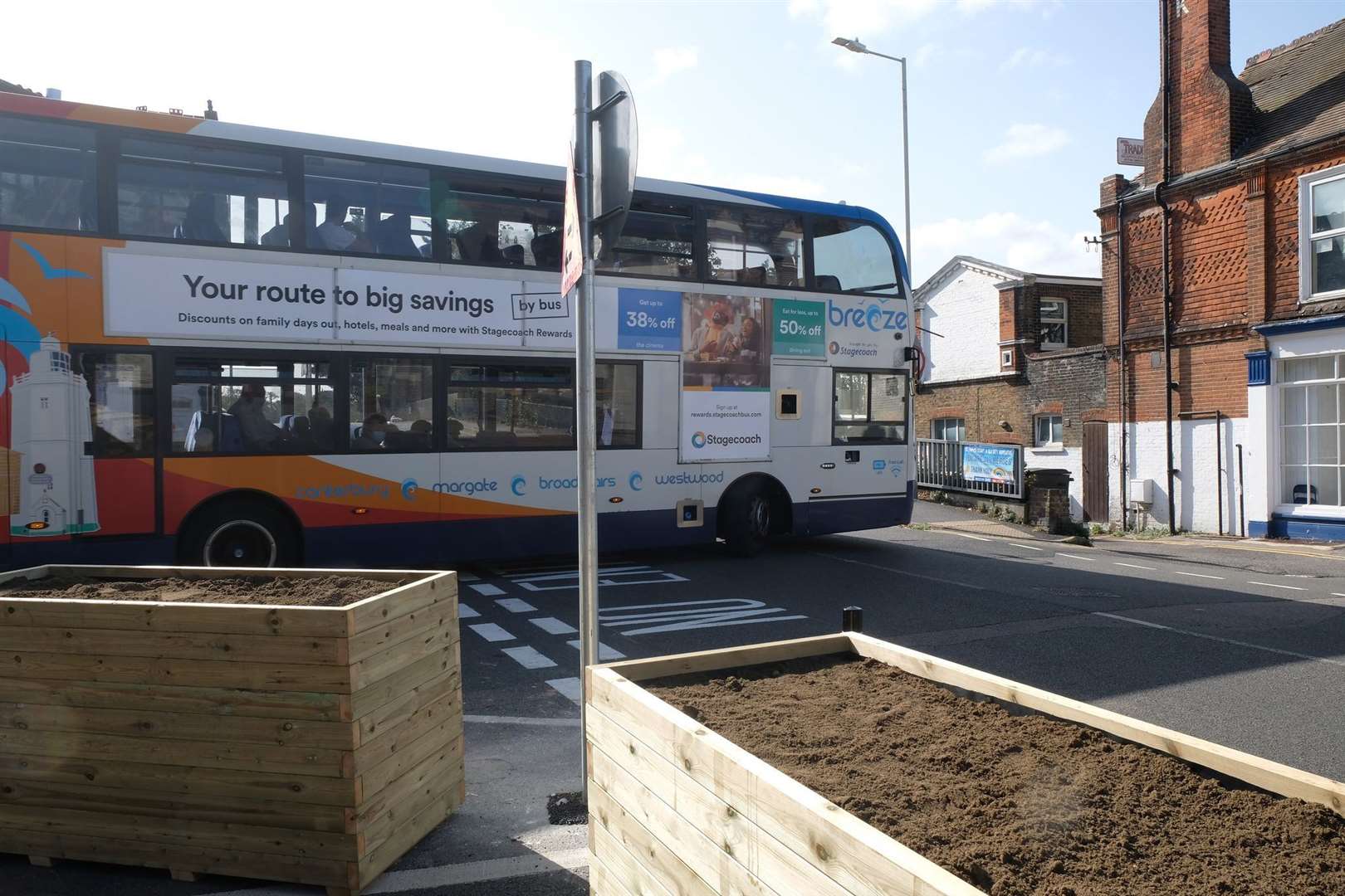 A bus struggling to turn out of Station Road, Westgate, as the new scheme was launched. Picture: Michael Grantham