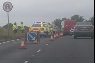 Officers attend the scene of the crash near the St Nicholas-at-Wade roundabout. Picture: Adam Bull