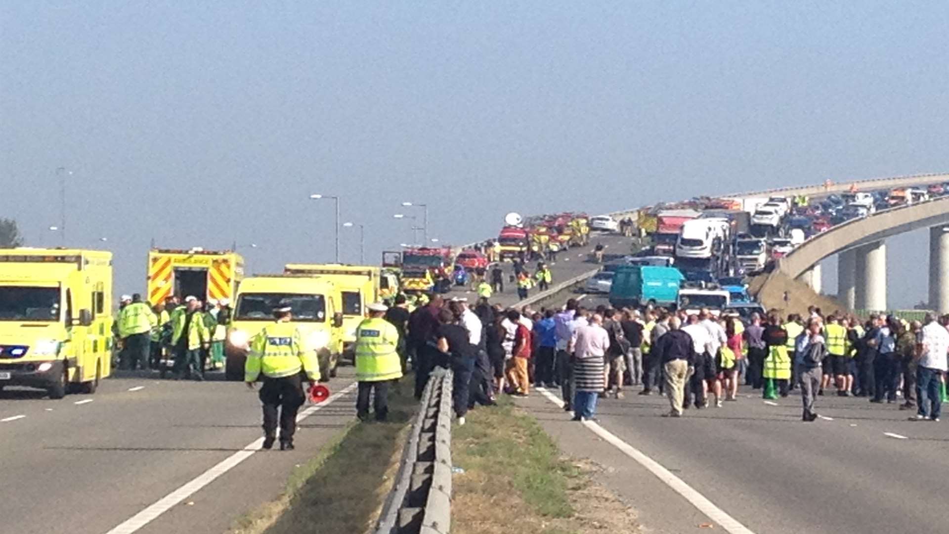 Crowds gather on the Sheppey Crossing after the pile-up