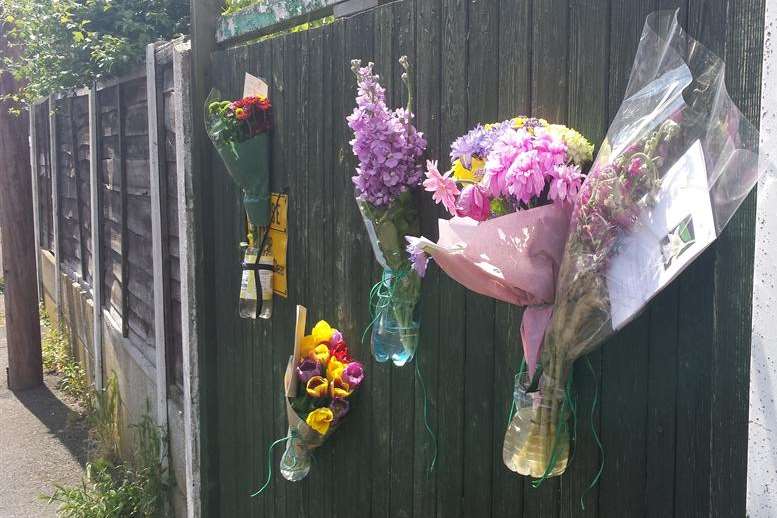 Neighbours and friends have left flowers for Kevin Laraman