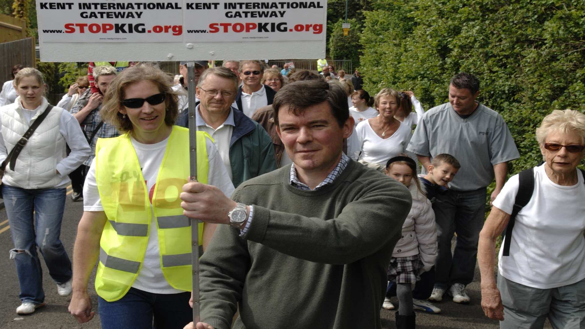 Sir Hugh Robertson MP in 2009 leading demonstrators against the KIG warehouse plan. He is to stand down at this year's General Election.