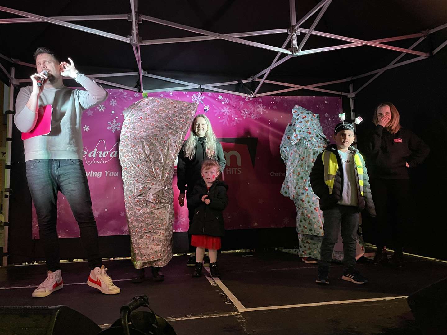 Two lucky children got to wrap an unusual present – their mothers – on stage