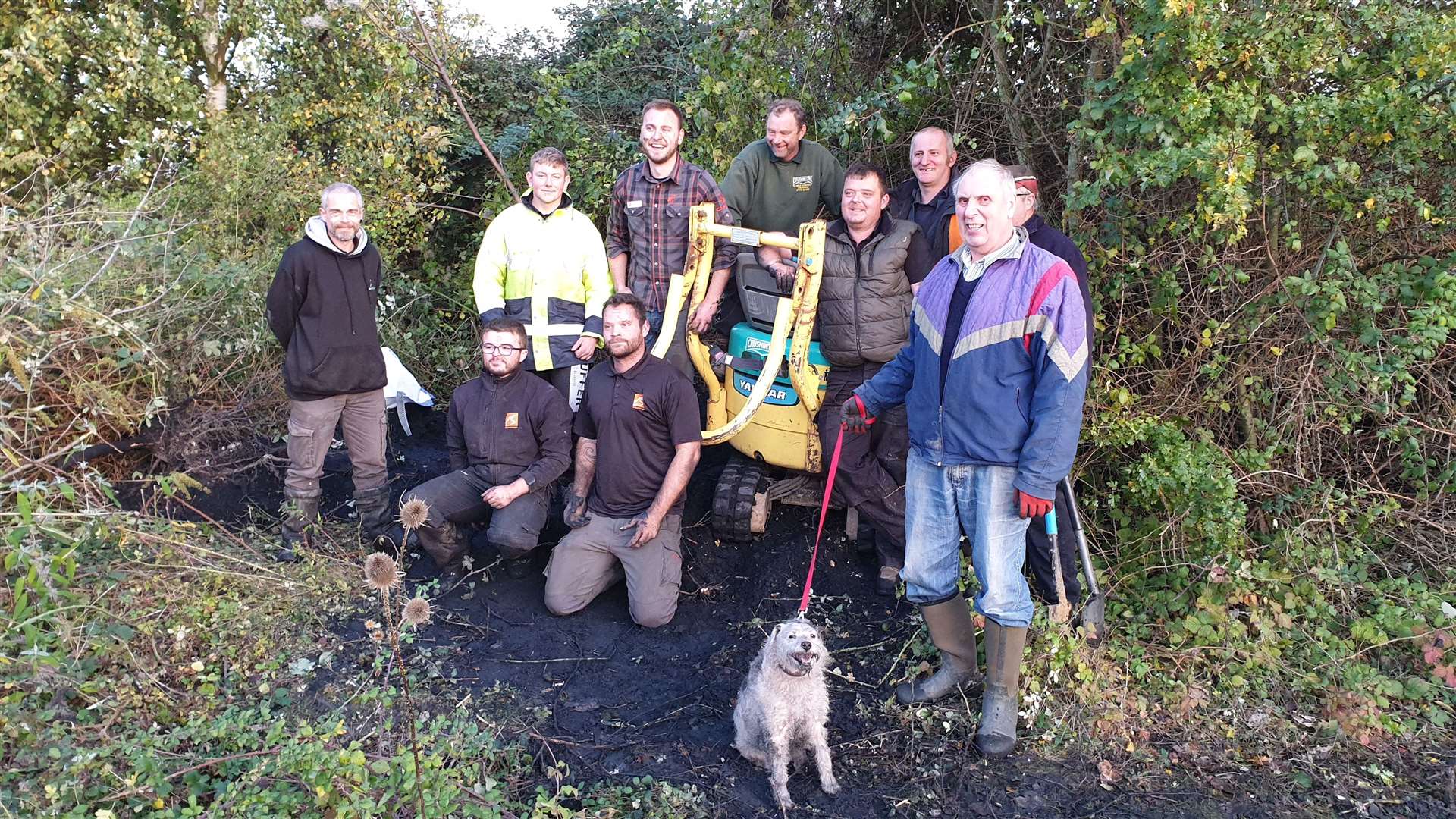Betteshanger Park workers and volunteers who were involved in the dog rescue pose with Bella Picture: Kieron Driver