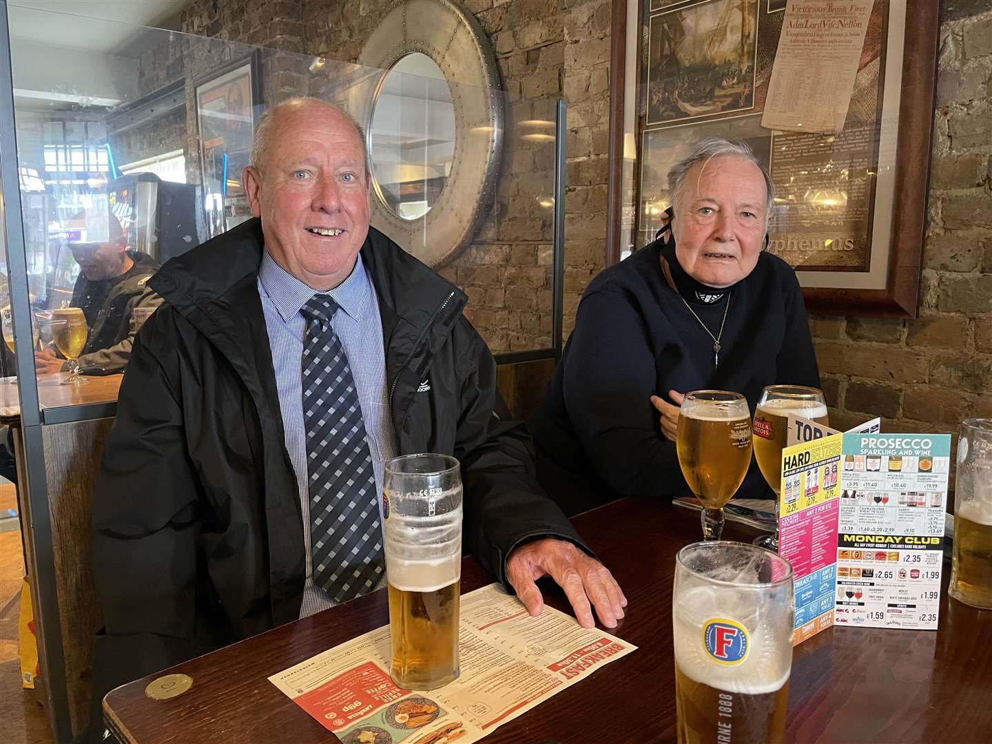 Eric Barnes, 73, and Peter De Moore, 75, enjoying a pint inside the Belle and Lion Wetherspoons pub in Sheerness High Street