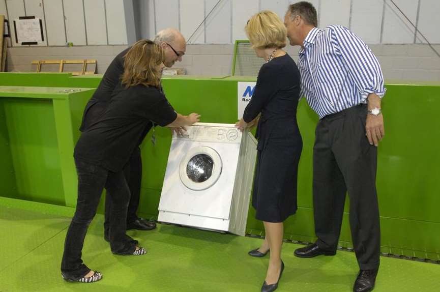 A washing machine is the first item to be recycled at the Sweeep depot at its launch in July 2007