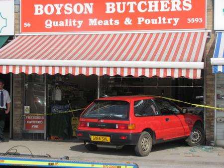 A Honda Civic smashed into the Istead Rise butcher's