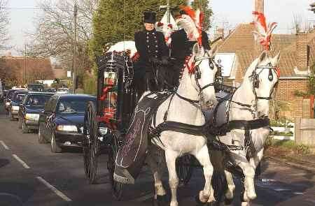 The funeral procession on its way to the church. Picture: JIM RANTELL