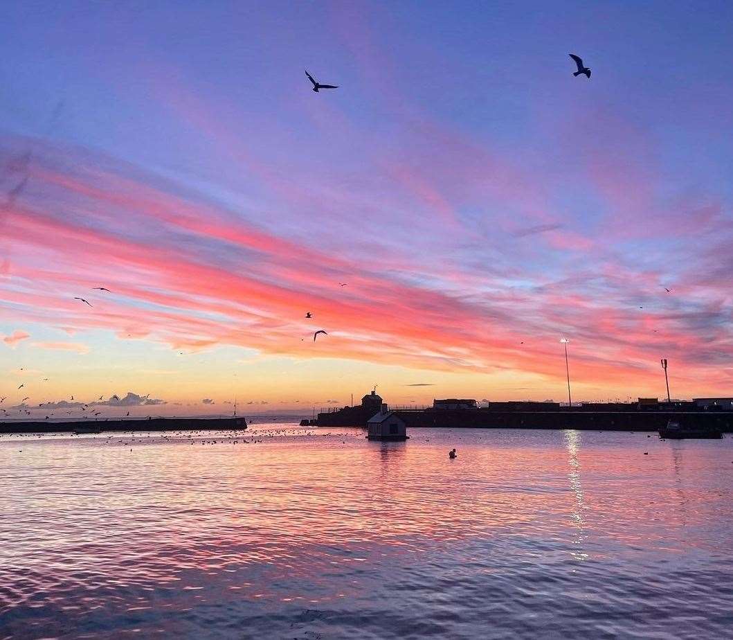 Rosie Percy is a big fan of the Folkestone sunsets. Pic: Instagram/@coolasfolke