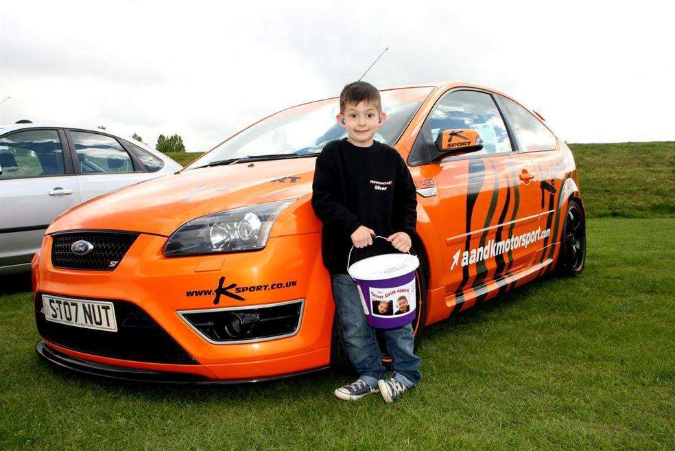 Oliver Smith with one of the cars which was on show at the weekend