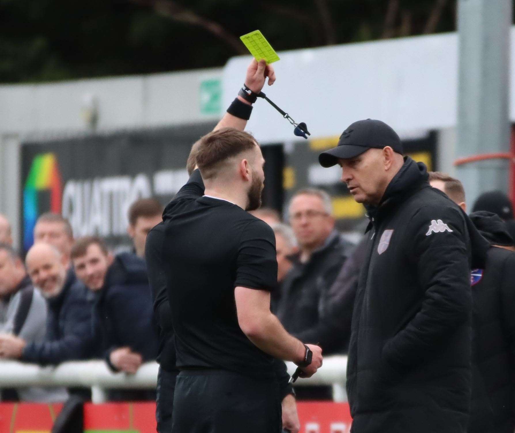Margate manager Mark Stimson is cautioned by referee Joshua Langley-Fineing. Picture: Max English (@max_ePhotos)