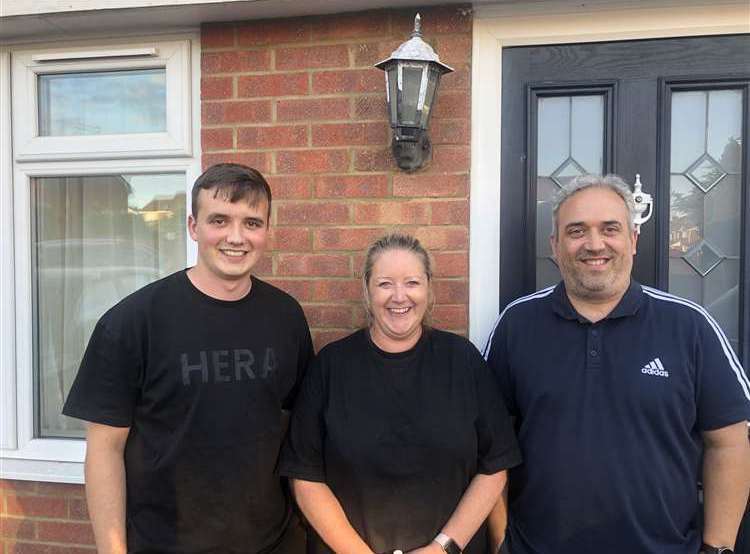 Luke, Emma, and Kevin Eagle outside their home in Northfleet