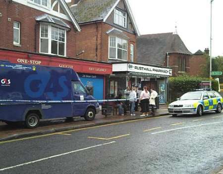 Police cordon off the One Stop off-licence in Rusthall. Picture: Neil Faraday.