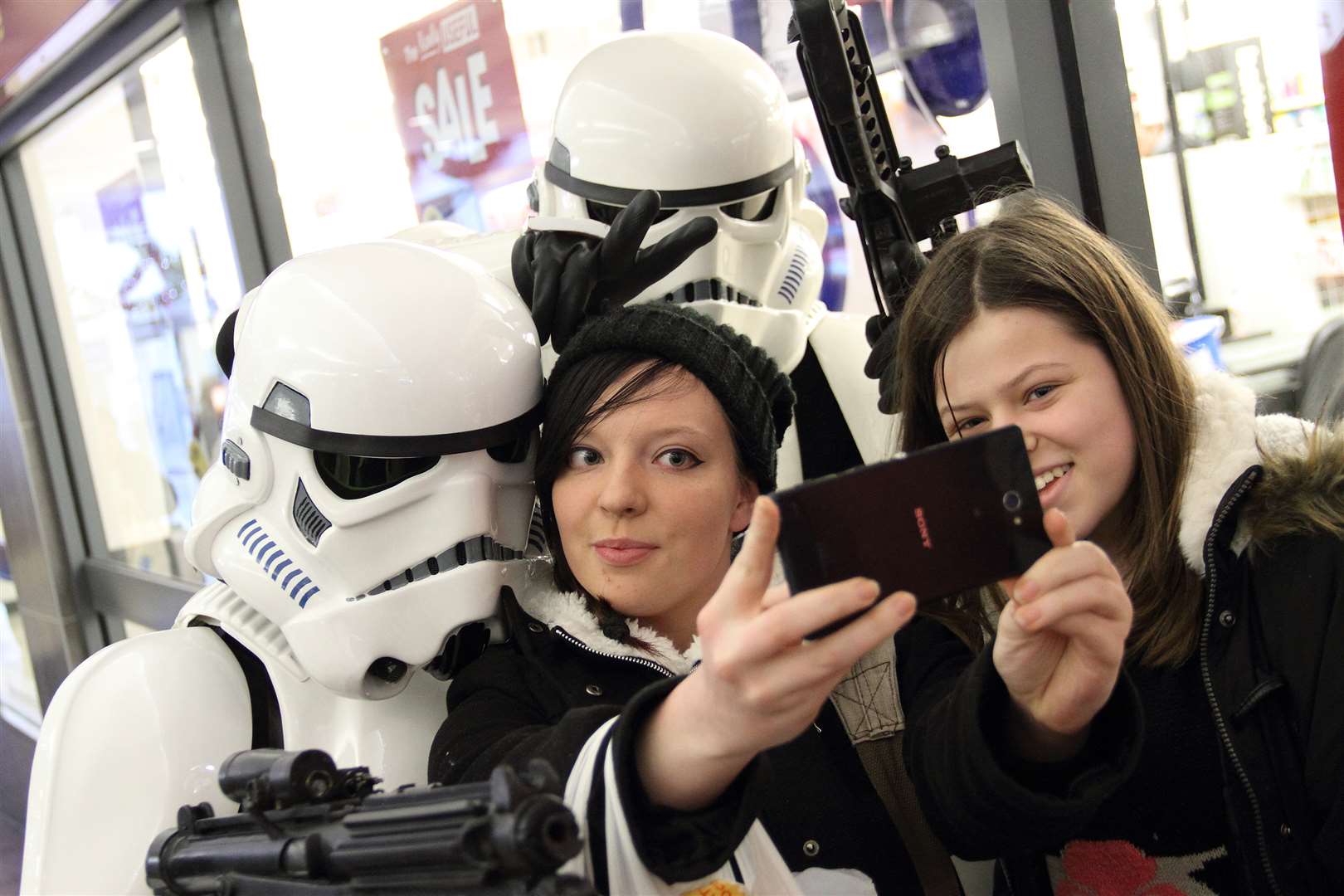 These two stormtroopers were certainly not all smiles when they photobombed a selfie