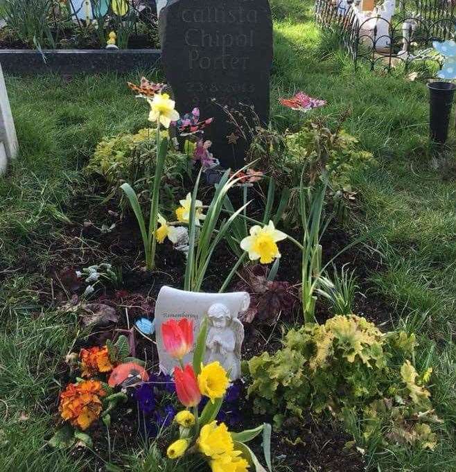 The family decorated the grave of their beloved daughter