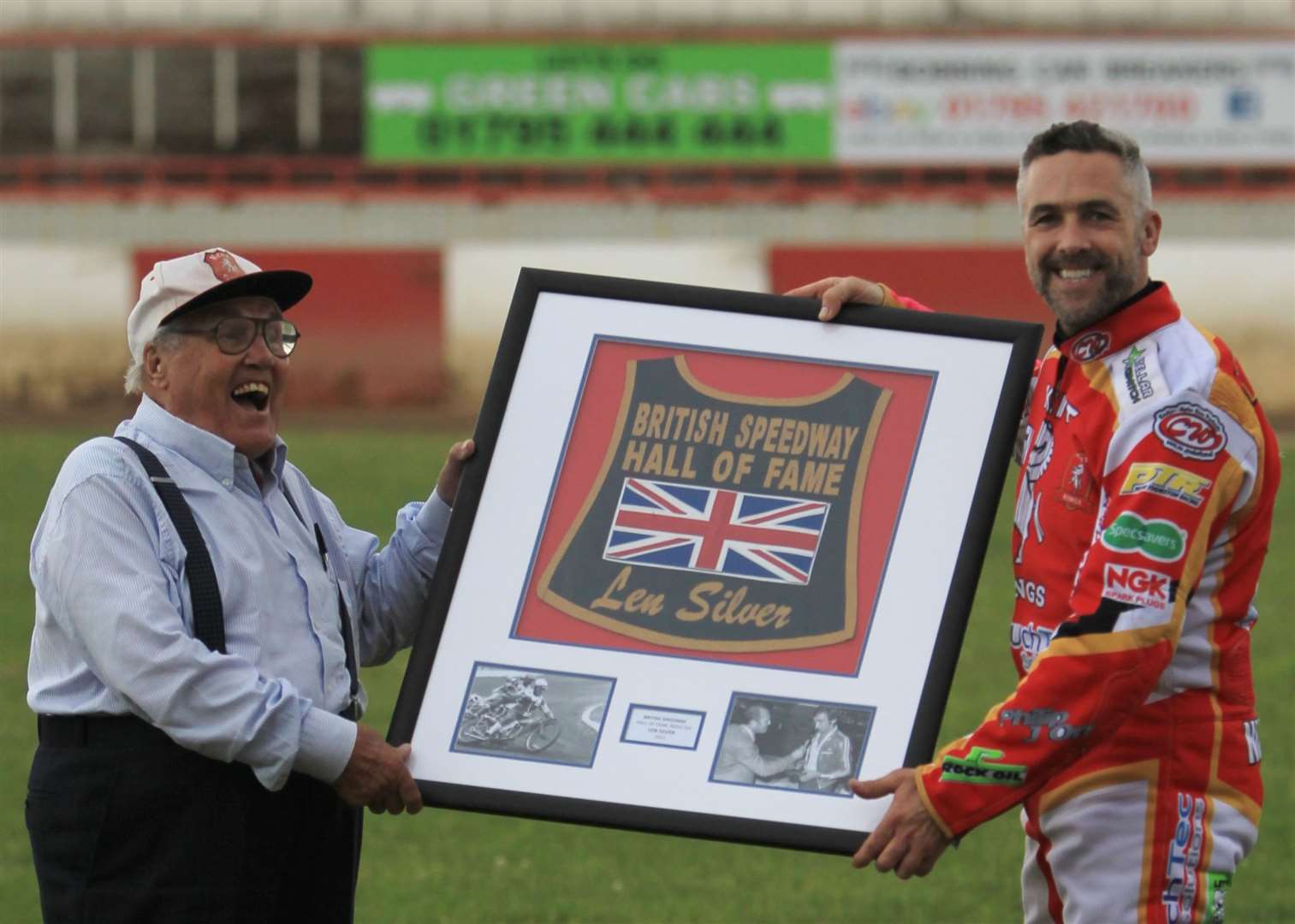 Len Silver with Scott Nicholls being presented with his Hall of Fame vest Picture: Geoff Young
